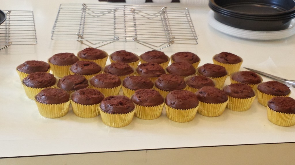 Delicious, airy, moist, bare nekkid chocolate cupcakes swathed in gold foil.  So sexy.