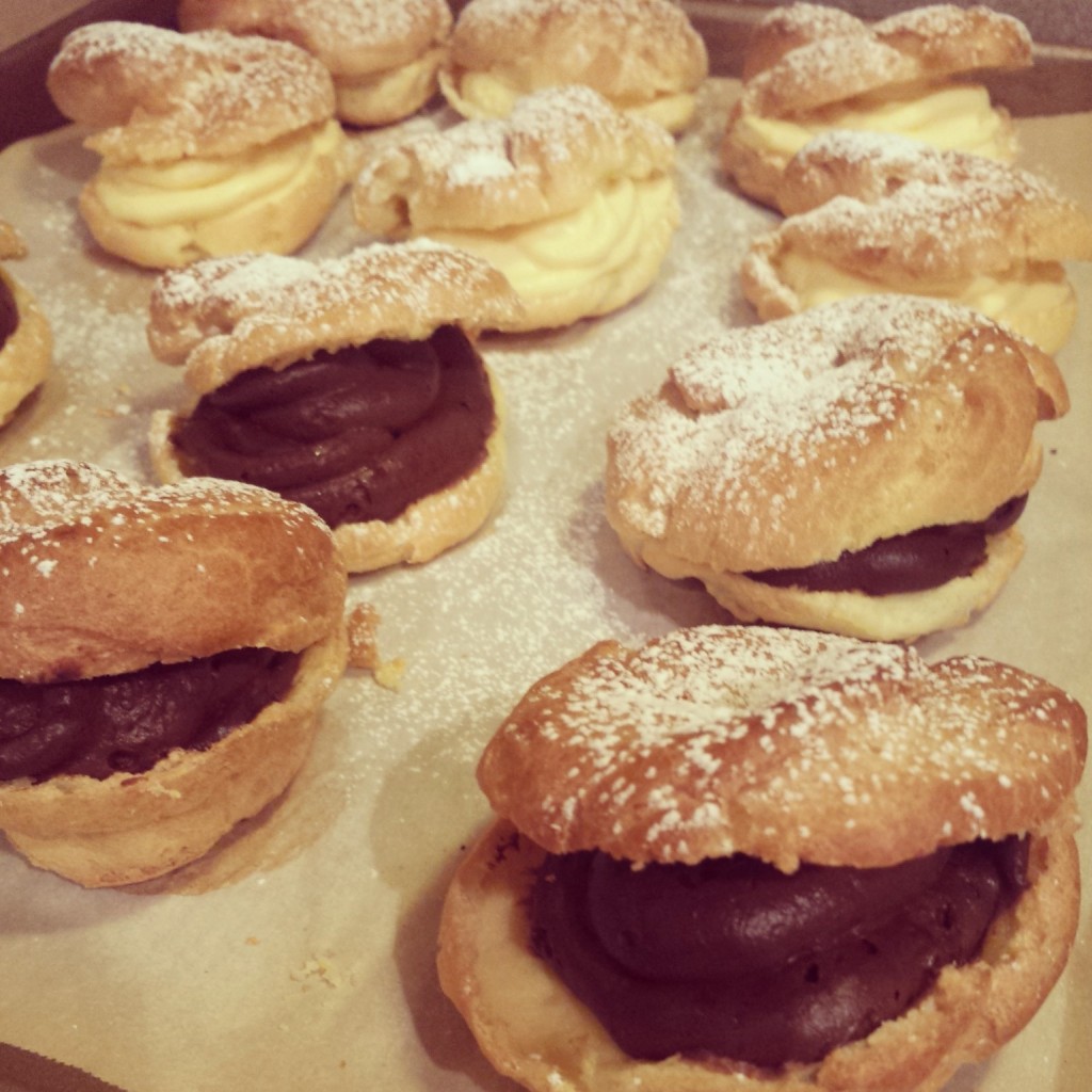 Chocolate and vanilla filled cream puffs